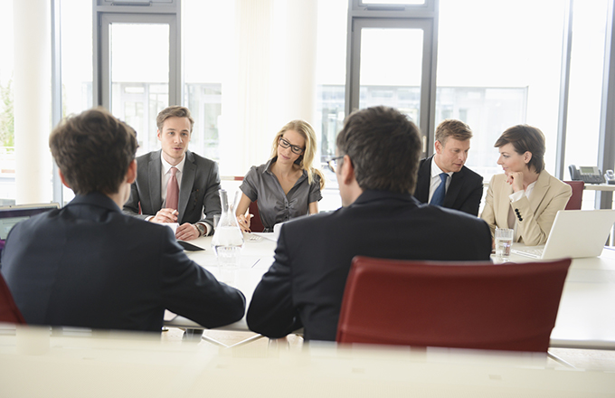 Use the internet to book a meeting room